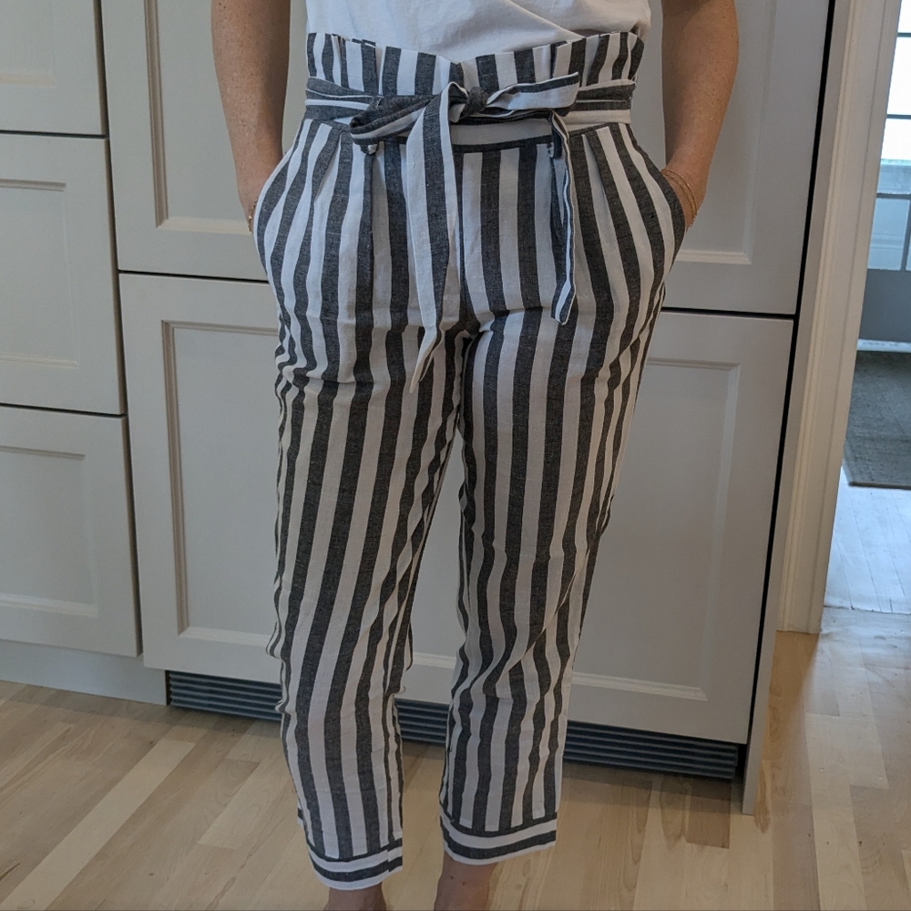 Grey and white striped paper bag pants